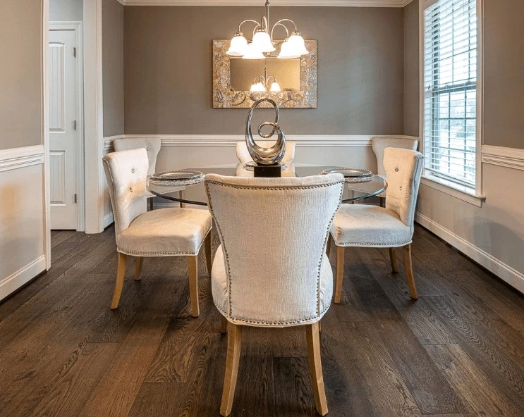 Dining room wood flooring in hand-scraped walnut-toned hardwood